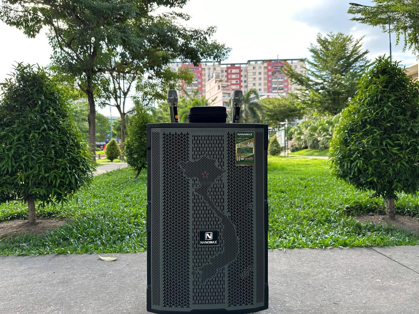 A large speaker in a parkDescription automatically generated